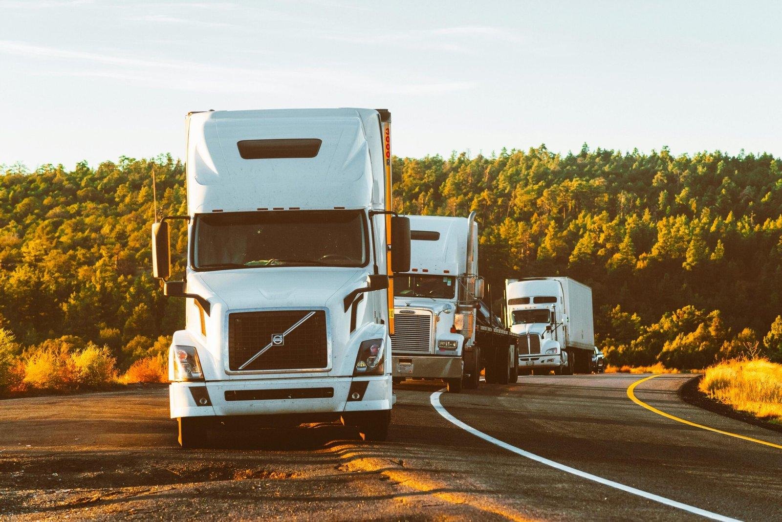 Fleet of trucks on the highway equipped with GPS tracking and real-time monitoring systems